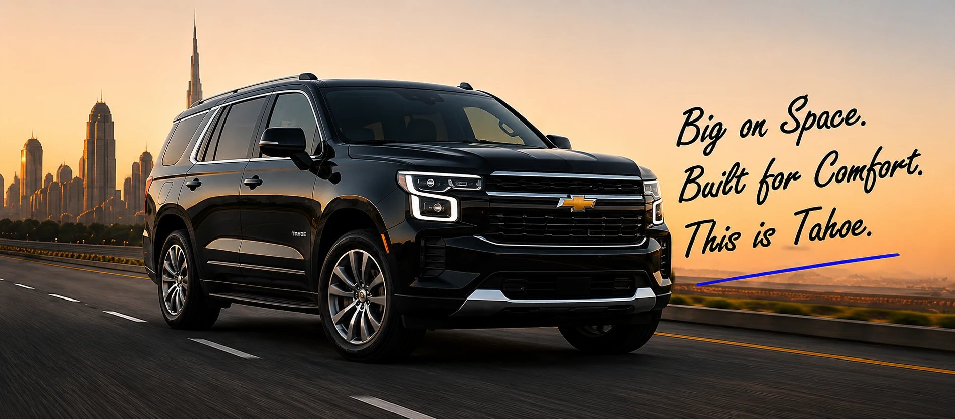 Chevrolet Tahoe on Sheikh Zayed Road with the Dubai skyline